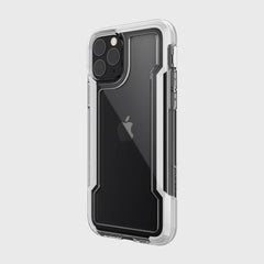 The Raptic iPhone 11 Pro Case - CLEAR highlights the triple camera setup on a black phone with its sleek, shock-absorbing design. It supports wireless charging, making it ideal for tech enthusiasts who want protection and convenience.