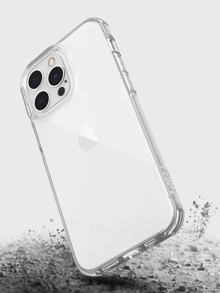 A clear iPhone 14 Pro case with sand on it from Raptic.
