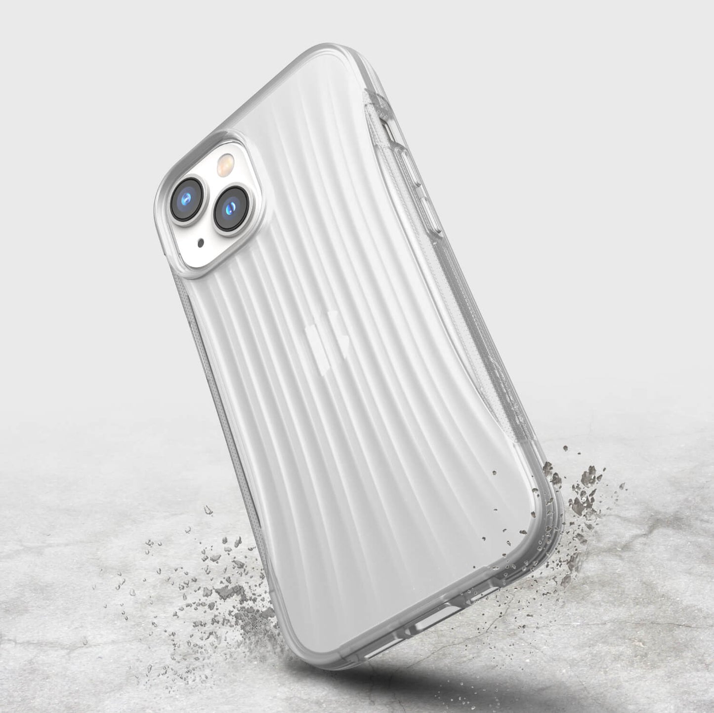 The back of an iPhone 14 Case ~ Clutch by Raptic with sand on it.