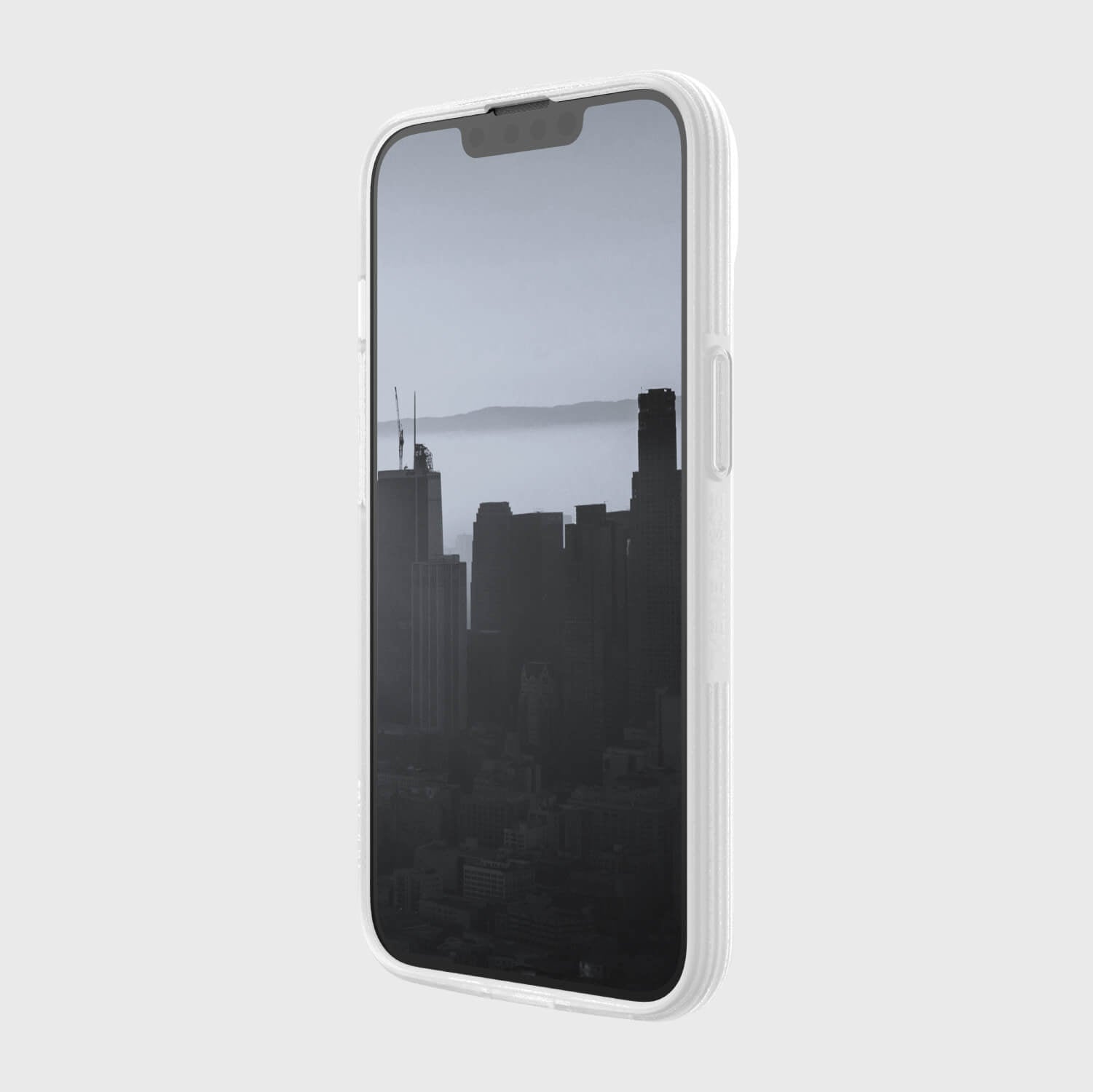 A Raptic Slim's white iPhone 14 Slim Case with a view of a city.