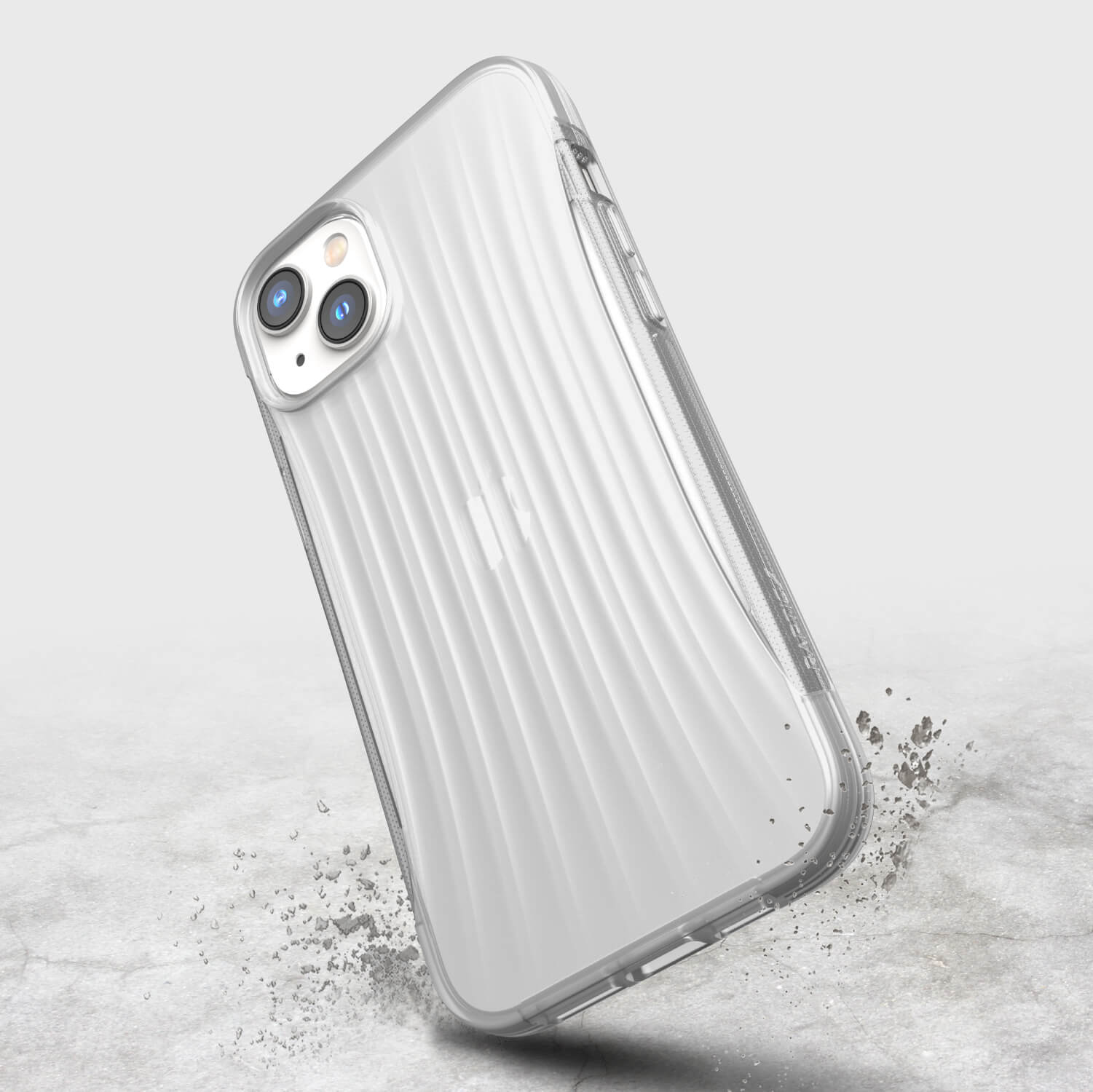 The back of a Raptic iPhone 14 Plus Case ~ Clutch with sand on it.