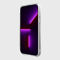 The back of a Raptic iPhone 14 Plus Case ~ Clutch with military-grade drop protection and a purple light on it.