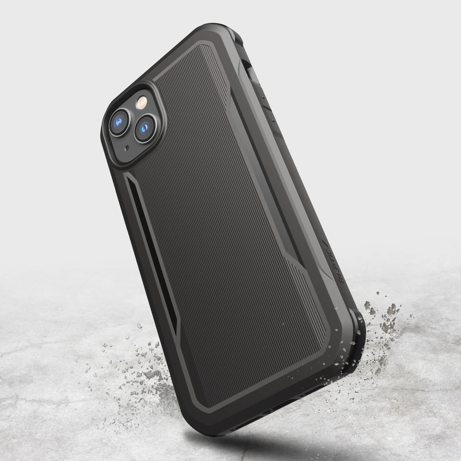 A biodegradable black Raptic iPhone 14 Plus Case - Fort Built for MagSafe with a splash of water on it, providing military-grade drop protection.