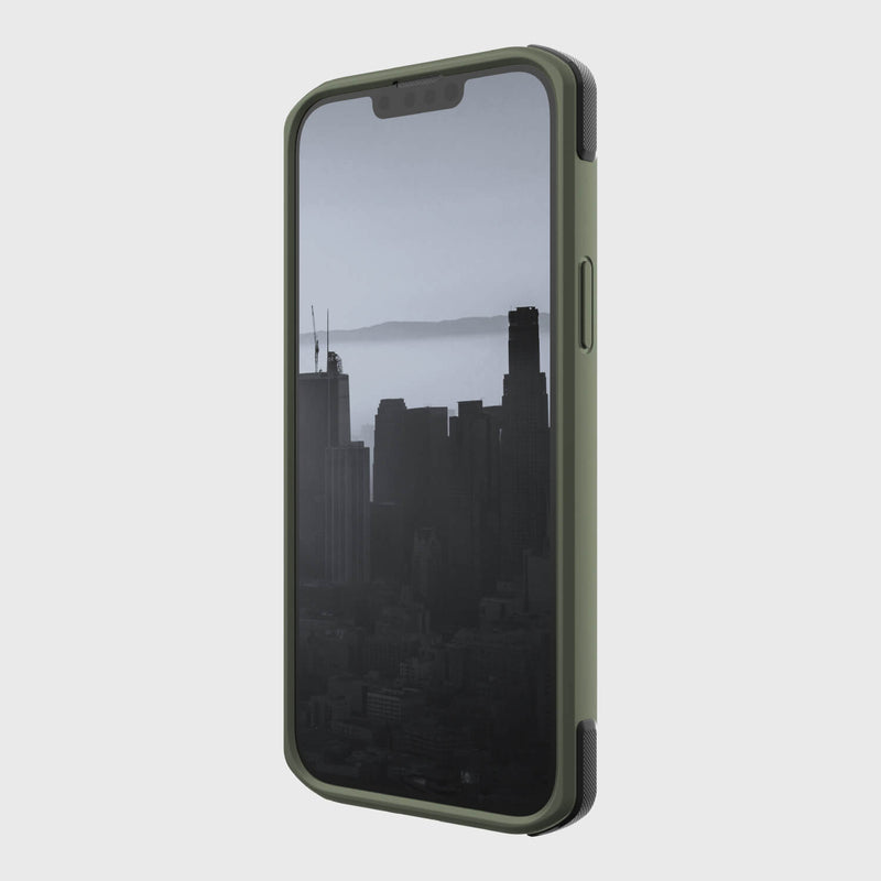 A green Raptic MagSafe iPhone 14 Plus case with a view of the city.