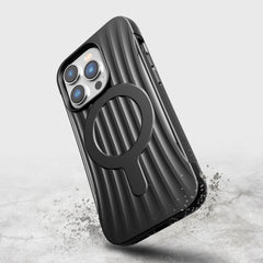 A black Raptic iPhone 14 Pro Case ~ Clutch MagSafe with a ring on it, offering military-grade drop protection.