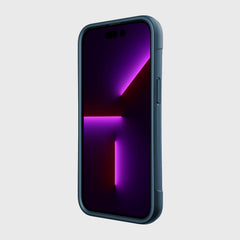 The back of an iPhone 14 Pro Case ~ Clutch with a purple light on it.