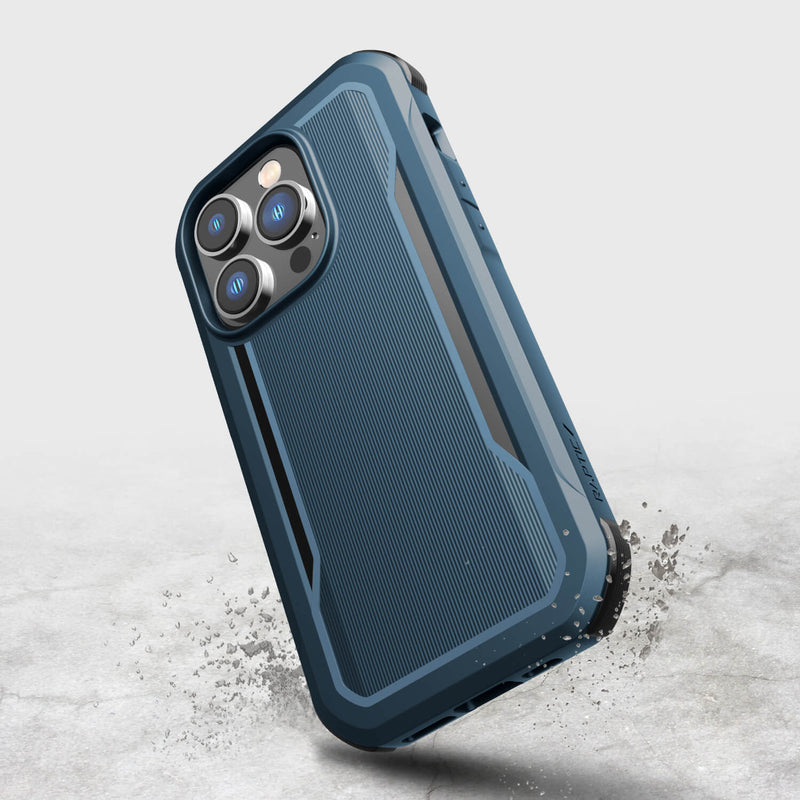 The blue iPhone 14 Pro case - Fort Built for MagSafe by Raptic features MagSafe magnets compatibility and a full rubber exterior.