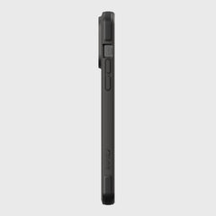 The side view of an iPhone 14 Pro Max in a Raptic Secure rugged black case highlights the volume buttons and camera bump. This case provides military-grade drop protection, ensuring durability for any adventure.