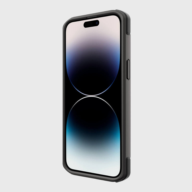 The iPhone 14 Pro Max, featuring a dual-tone black and gray display, is encased in a Raptic Secure black MagSafe compatible cover offering military-grade drop protection, set against a plain white background.