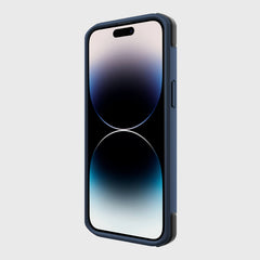 IPhone 14 Pro Max with a reflective screen and dual camera cutout, encased in a Raptic blue case providing military-grade drop protection. The display features minimalist abstract gradient circles.