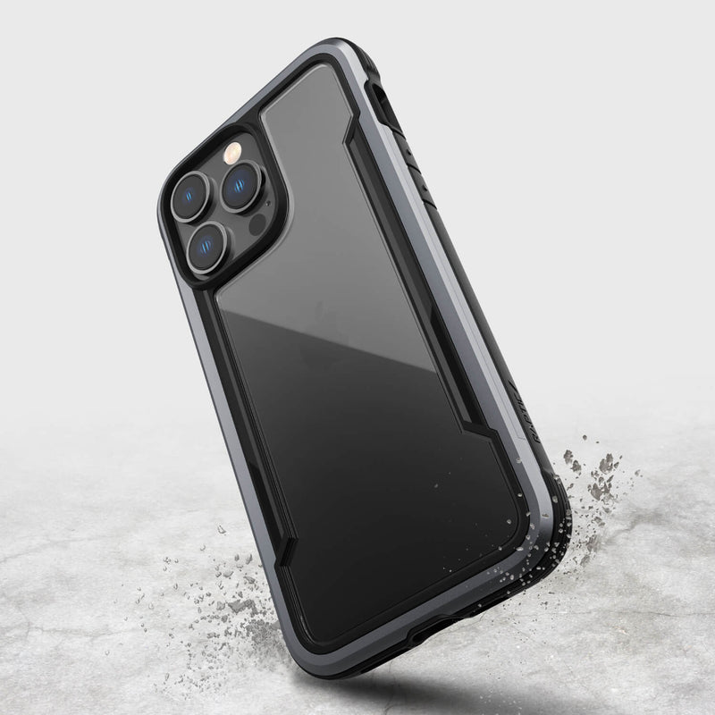 The iPhone 14/15 Pro Max Case - Shield by Raptic is shown in black.