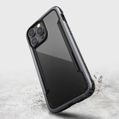 The iPhone 14/15 Pro Max Case - Shield by Raptic is shown in black.