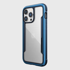 The back view of an iPhone 14/15 Pro Max Case - Shield by Raptic in blue with MagSafe charger compatibility.