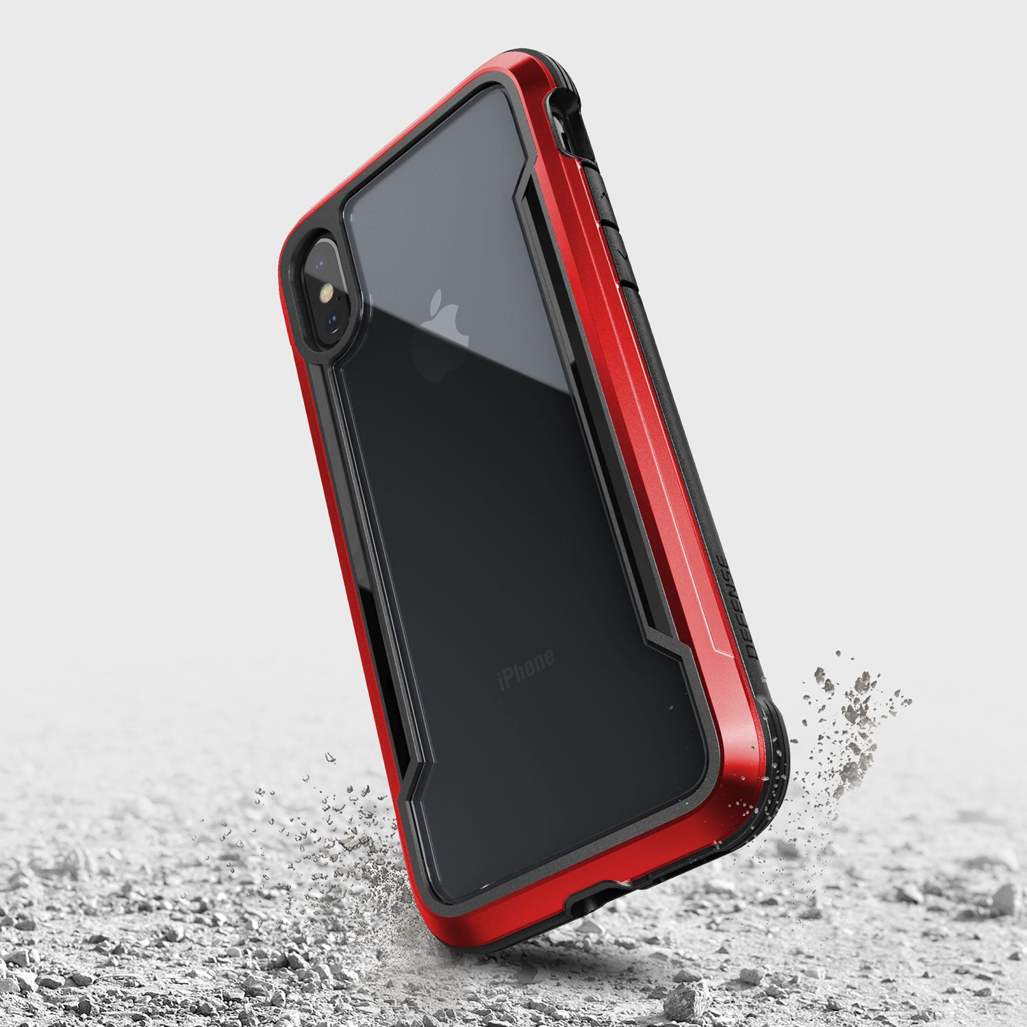 A Raptic SHIELD case for iPhone XS Max providing drop protection, found on the ground.