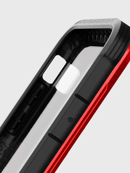A red and black iPhone XS Max Case - Raptic Shield with drop protection.