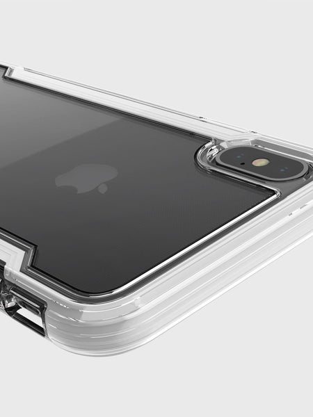 The Raptic iPhone X/XS Case - CLEAR highlights the camera and Apple logo, offering military-grade drop protection with anti-yellowing and anti-scratch features for lasting clarity.